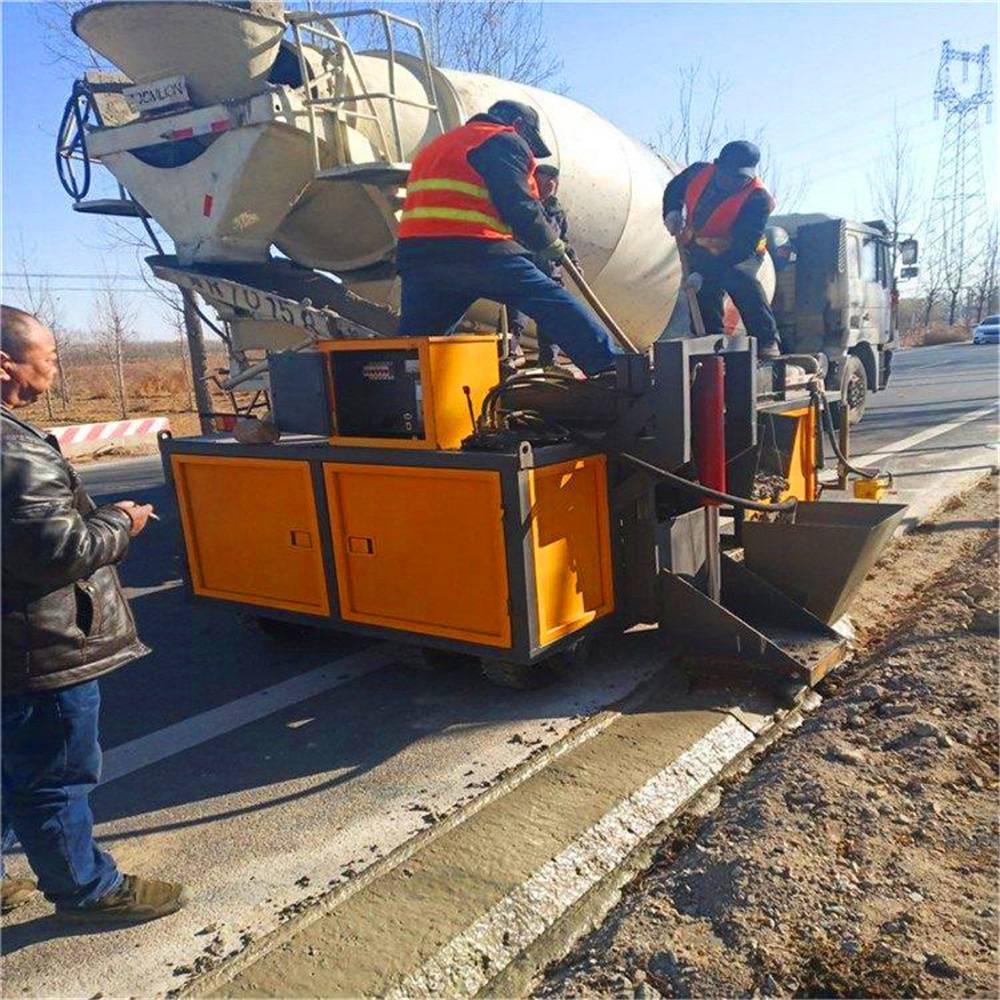 云發(fā)路肩石攤鋪成形機-馬路牙子一體機 路沿石現澆滑模機